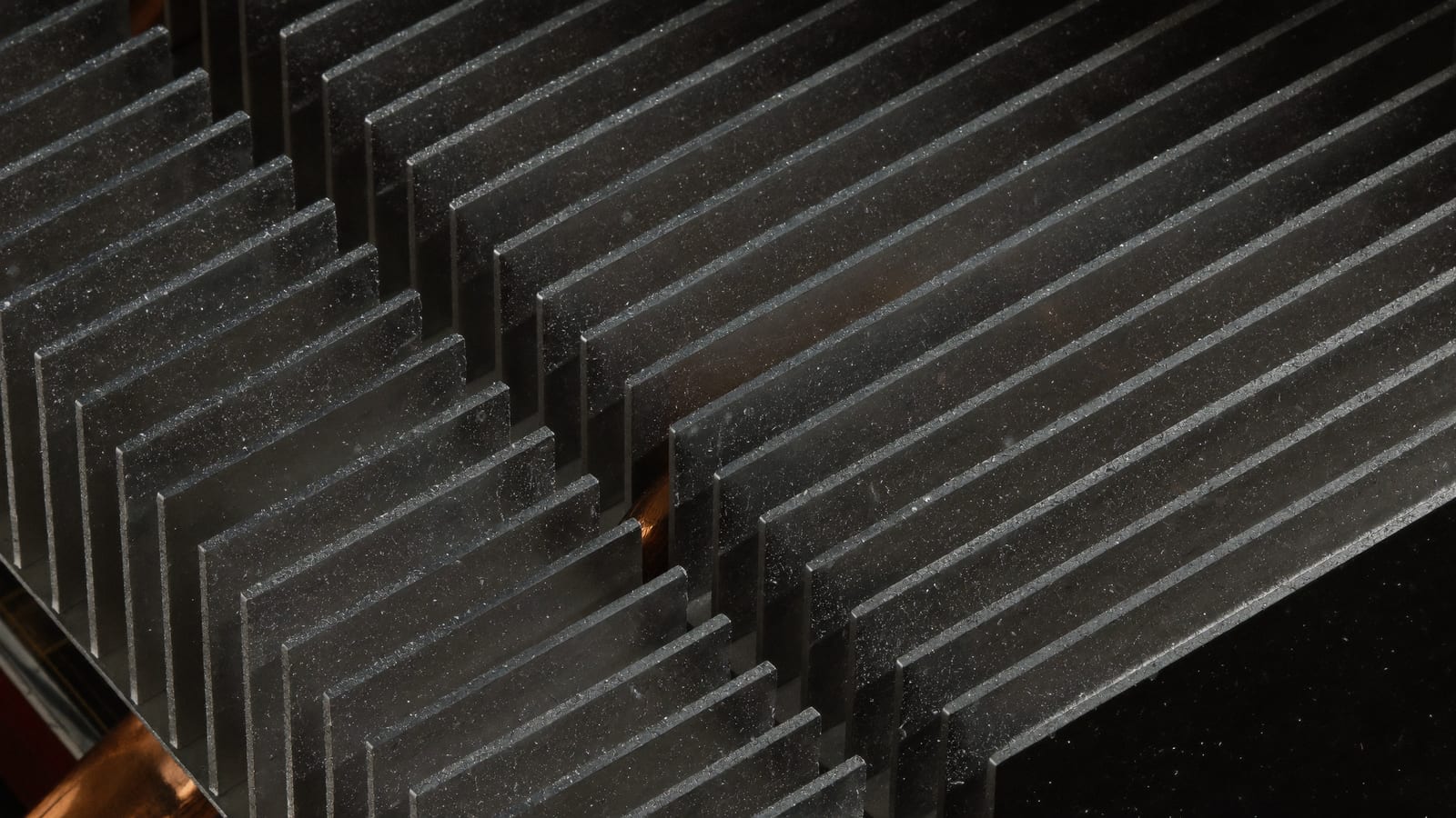 A used graphics card out of its case on a workbench