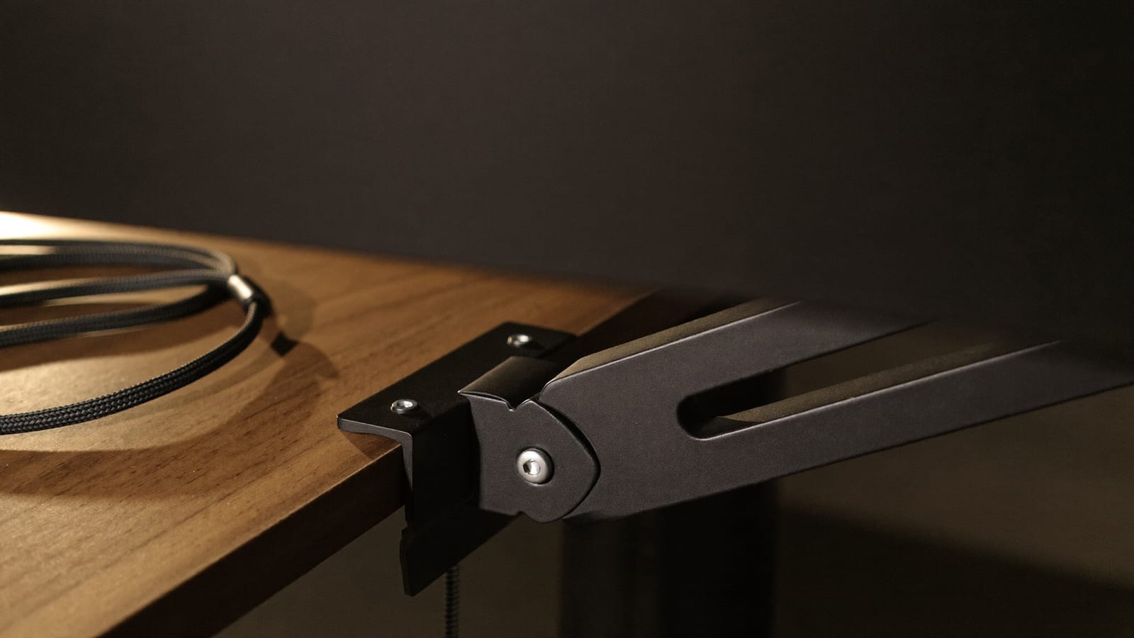 A monitor on a home-office desk, seen at working height